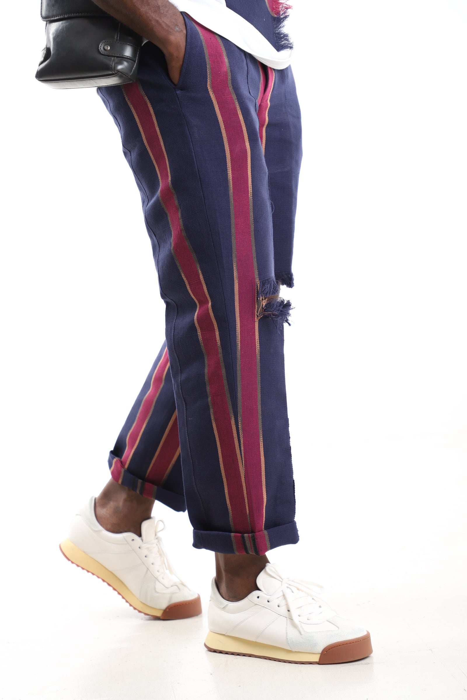 King Kaftan Distressed Handwoven Aso-Oke Tapered Striped Pants – Side View – African men's fashion Nigeria