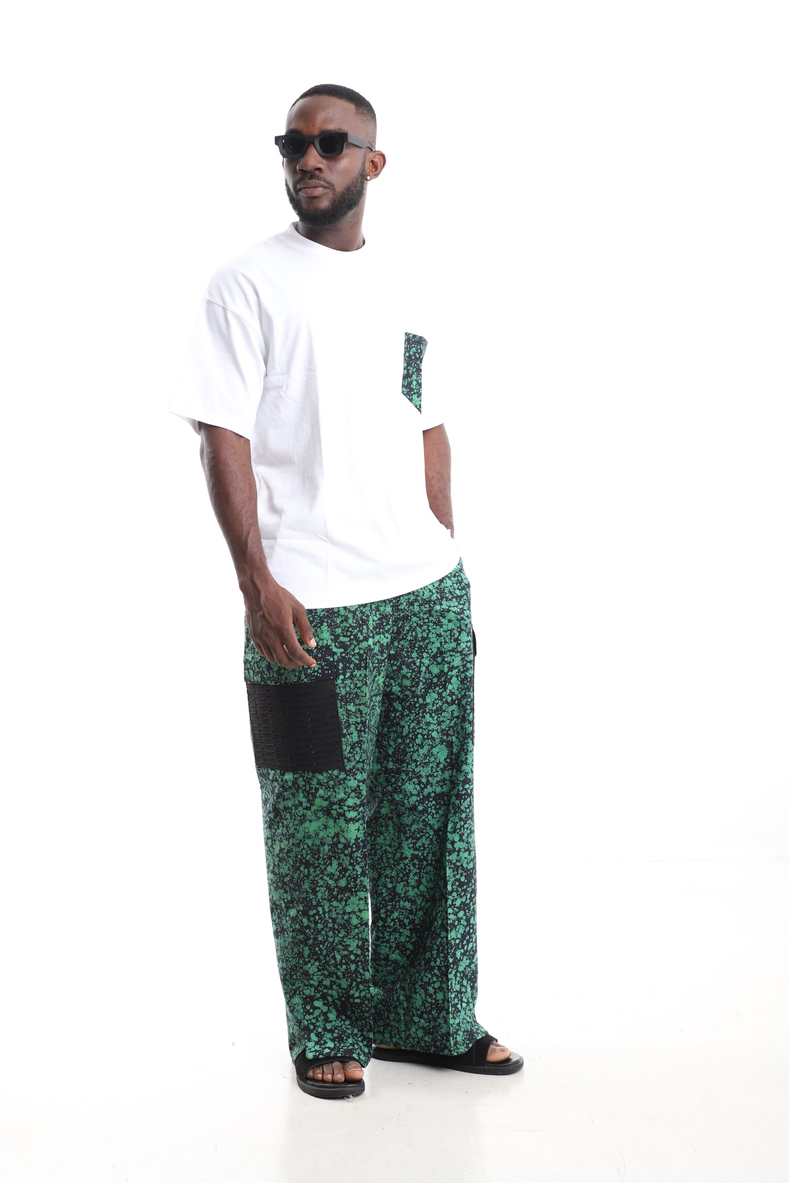 King Kaftan Emerald Splatter Adire Cargo Pants Set with Oversized White T-Shirt – Side View – African men's fashion Nigeria