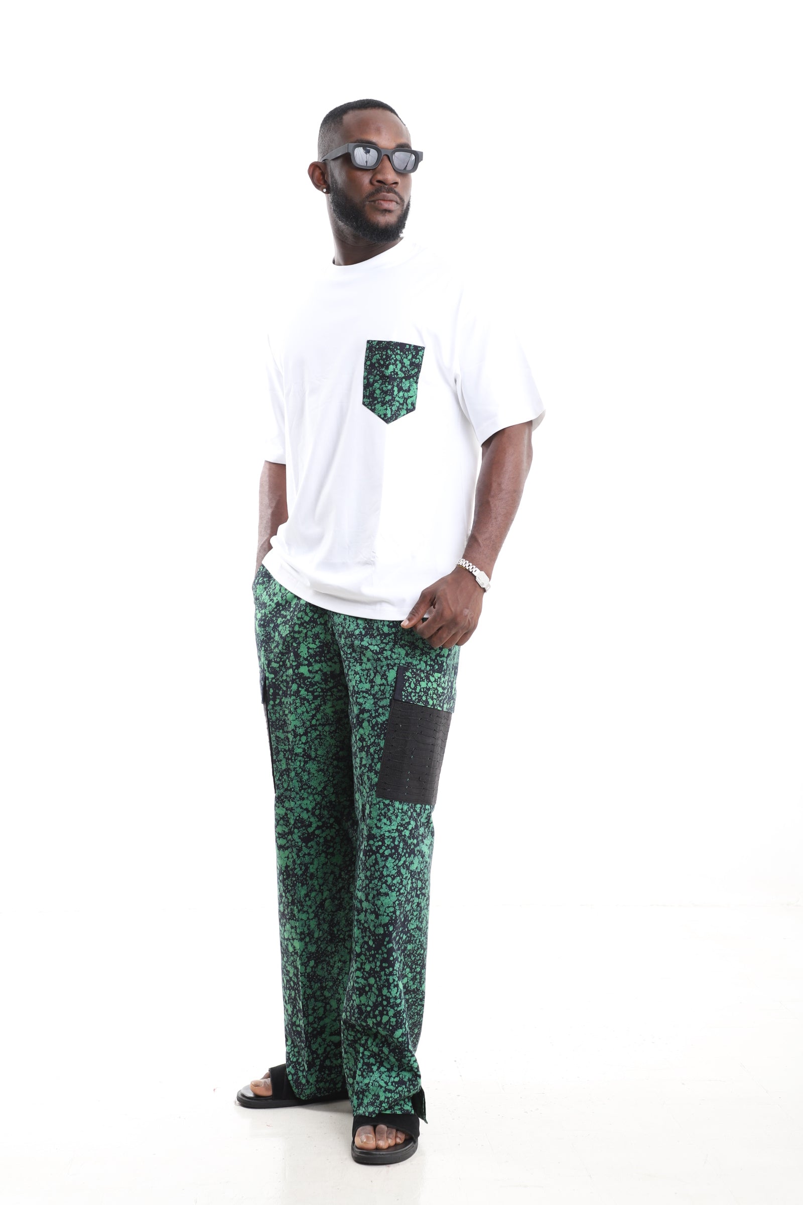 King Kaftan Emerald Splatter Adire Cargo Pants Set with Oversized White T-Shirt – Black Utility Cargo Pocket Detail – African men's fashion Nigeria