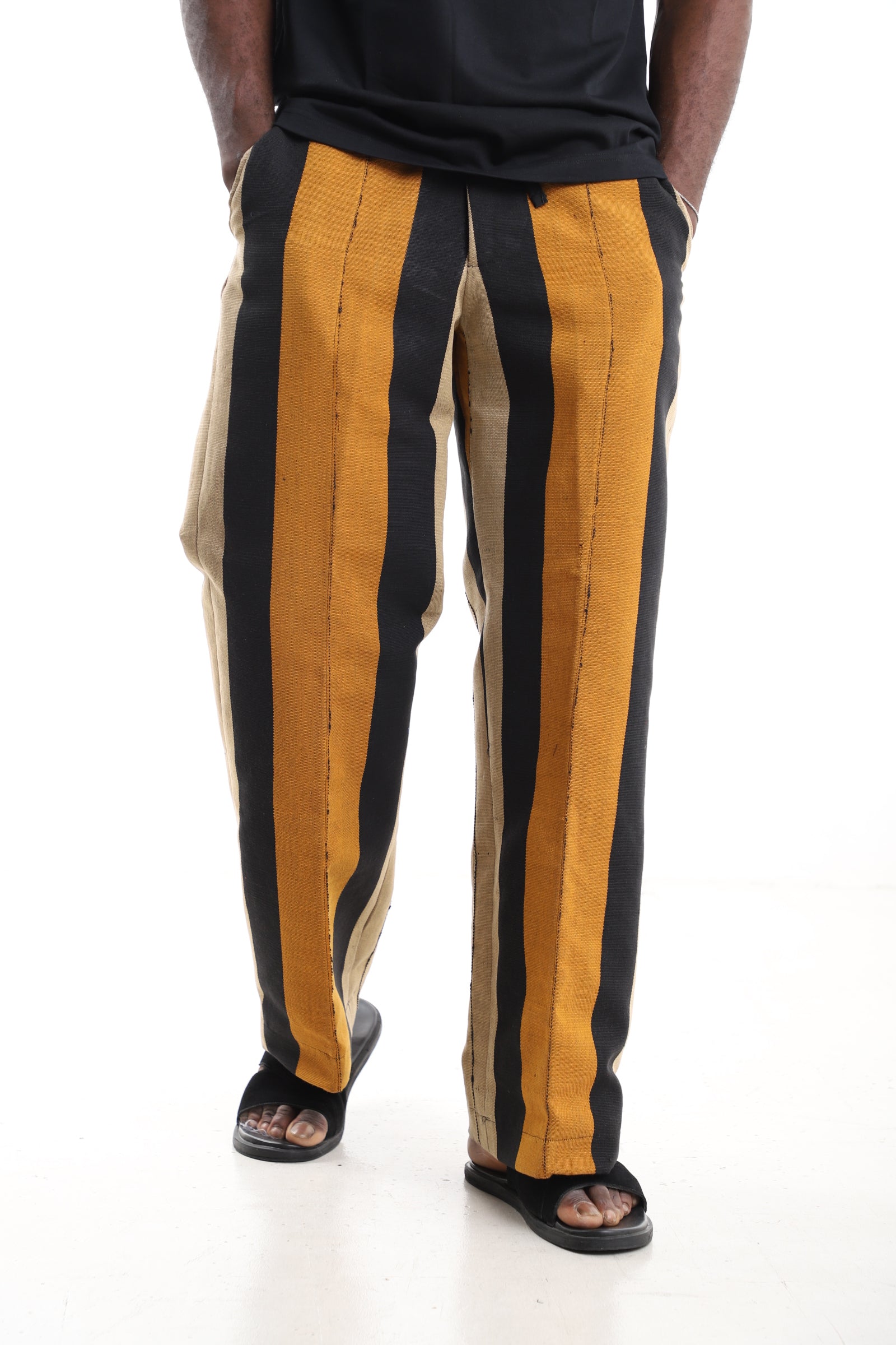 King Kaftan Handwoven Striped Cotton Aso-Oke Wide-Leg Pants – Front View – African men's fashion Nigeria