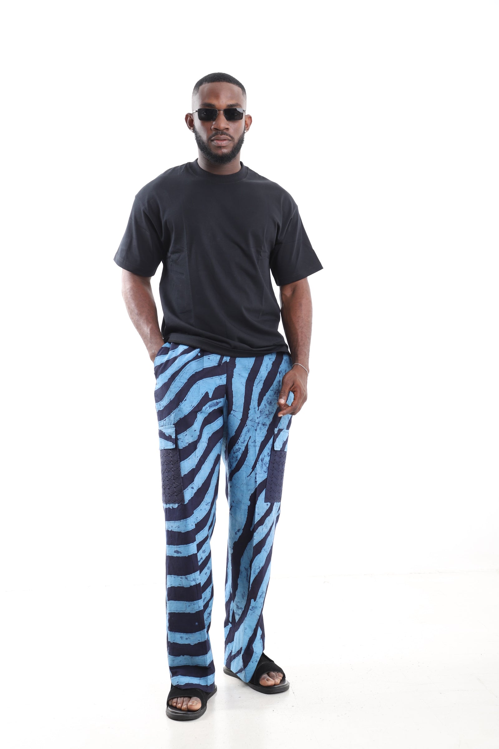 King Kaftan Blue Zebra Stripe Adire Cargo Pants Set with Oversized Black T-Shirt – Front View – African men's fashion Nigeria