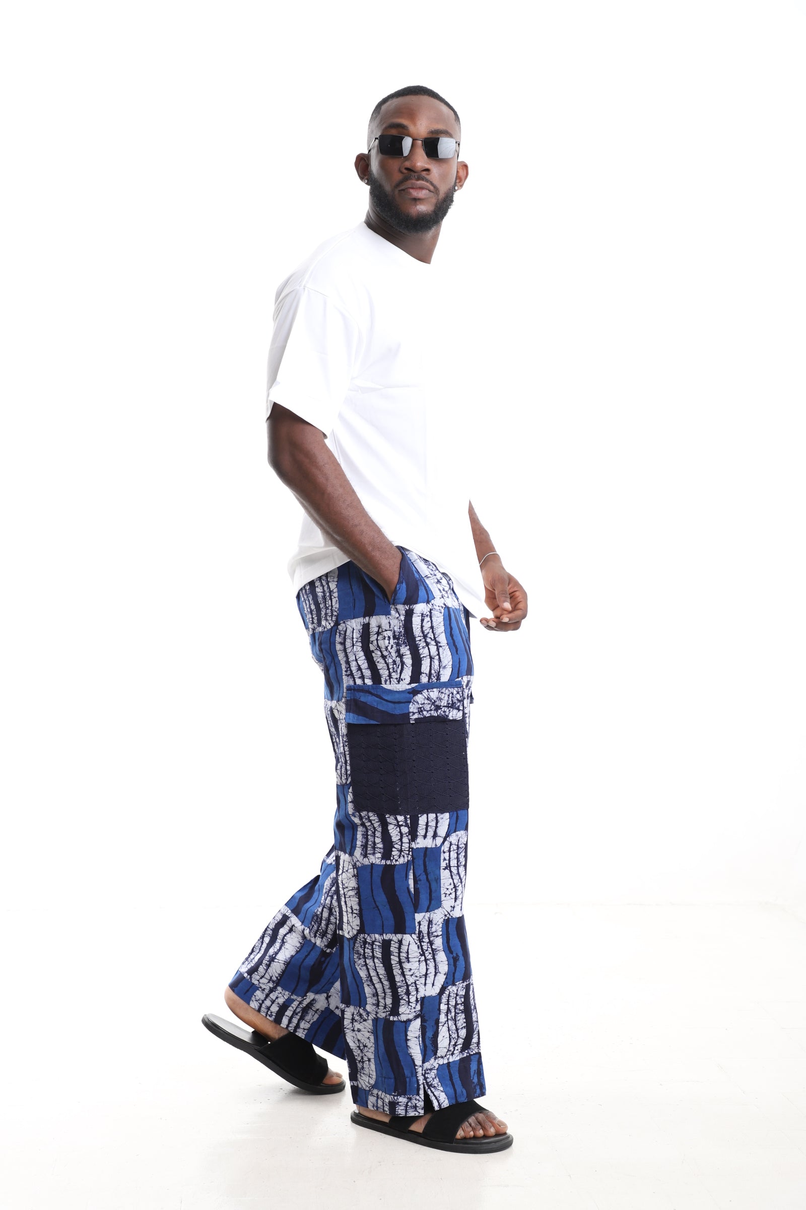 King Kaftan Blue Wave Adire Cargo Pants Set with Oversized White T-Shirt – Side View – African men's fashion Nigeria