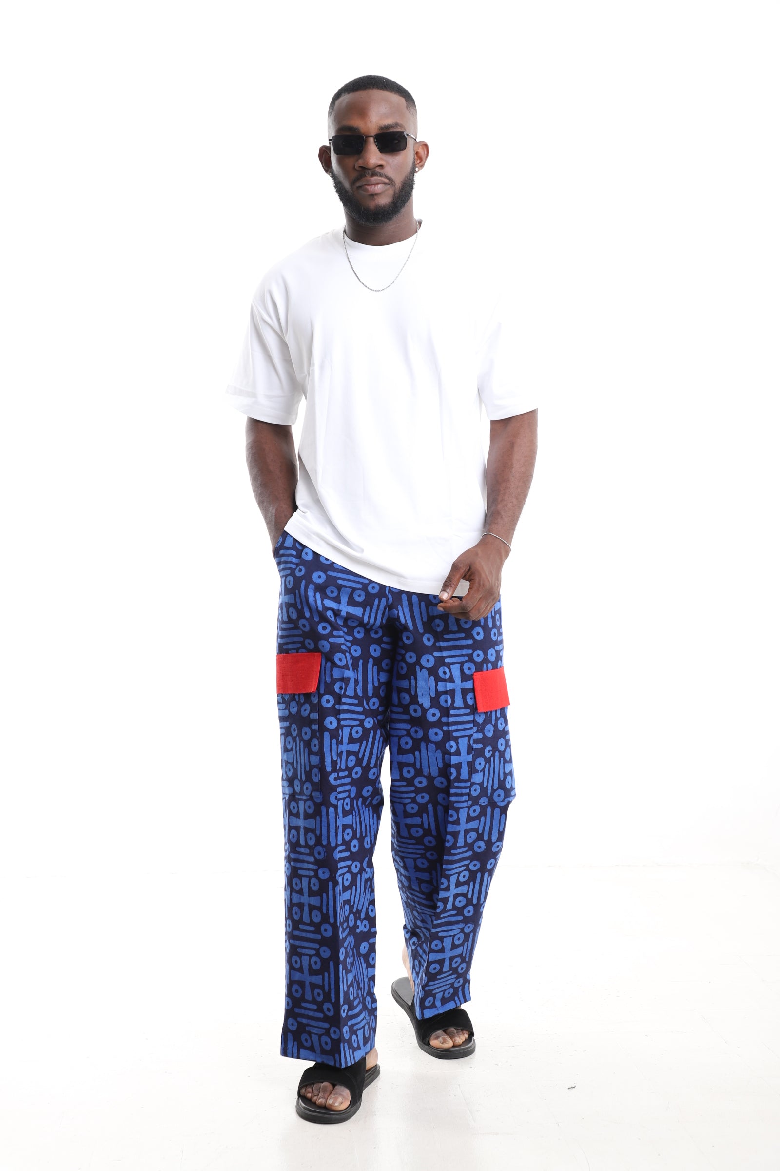King Kaftan Blue Geometric Adire Cargo Pants Set with Oversized White T-Shirt – Front View – African men's fashion Nigeria