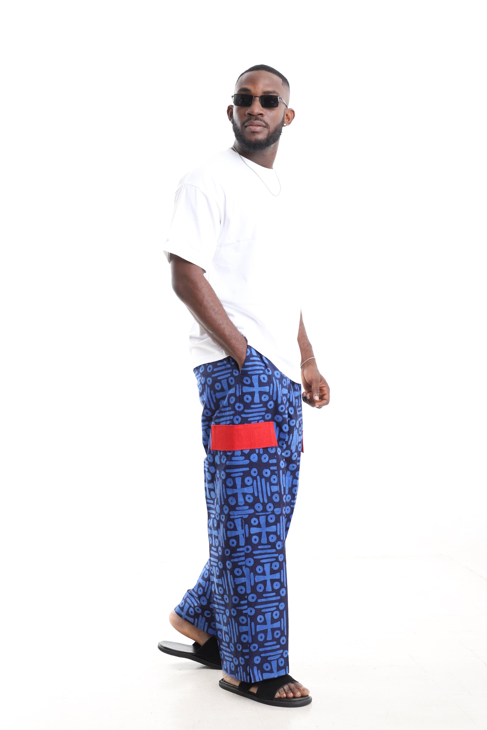 King Kaftan Blue Geometric Adire Cargo Pants Set with Oversized White T-Shirt – Side View – African men's fashion Nigeria