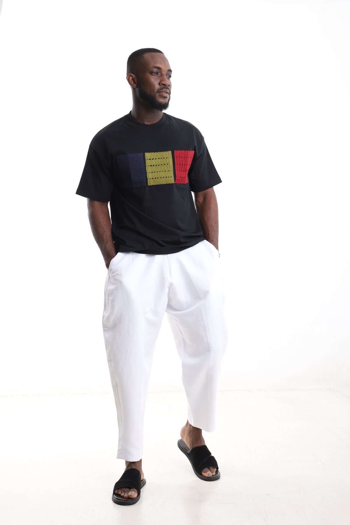 King Kaftan Block Patchwork T-Shirt and White Linen Pants Set – Front View – African men's fashion Nigeria