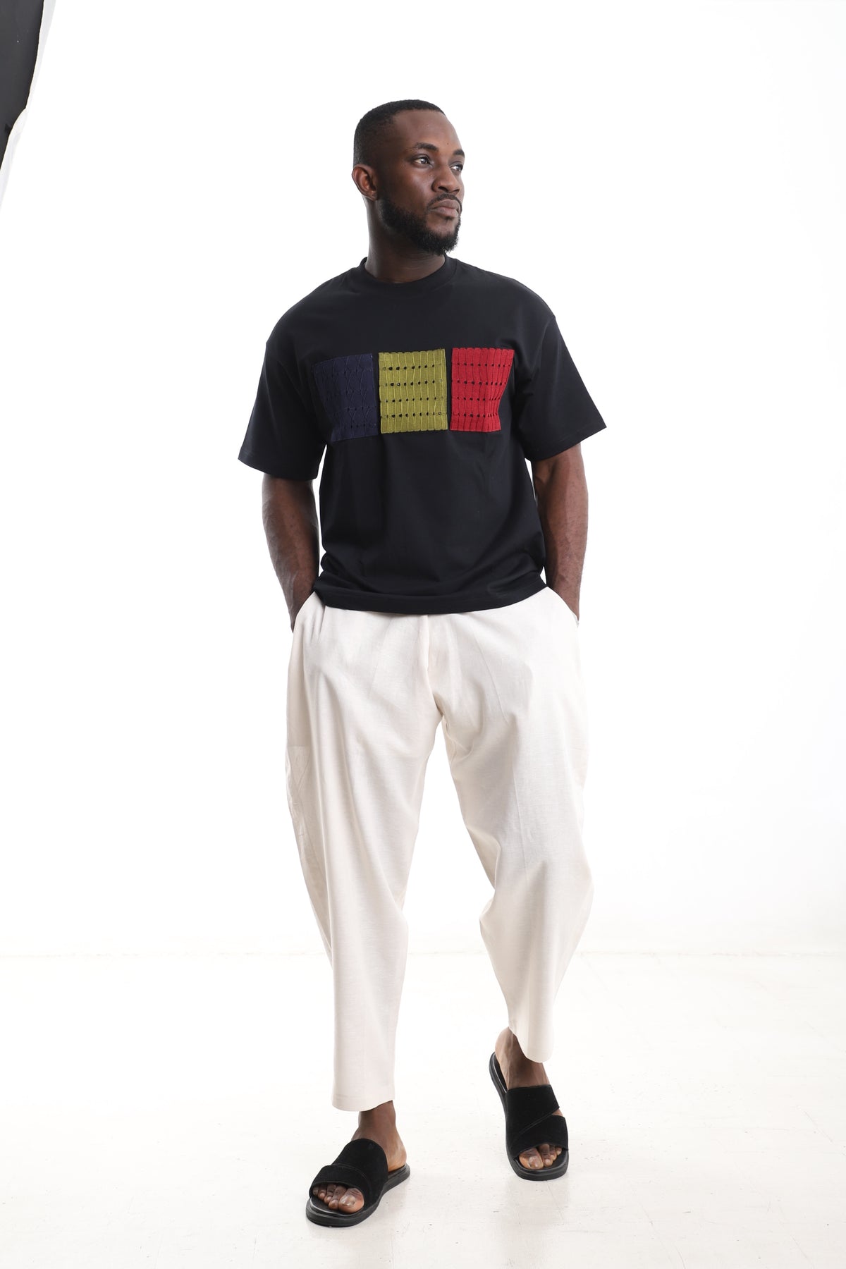 King Kaftan Block Patchwork T-Shirt and Cream Linen Pants Set – Front View – African men's fashion Nigeria