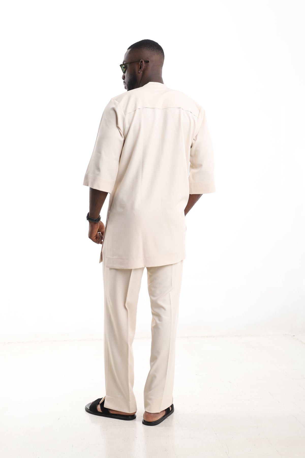 King Kaftan Pintuck-Placket Polished Cotton Cream Senator Wear – Back View – African men's fashion Nigeria