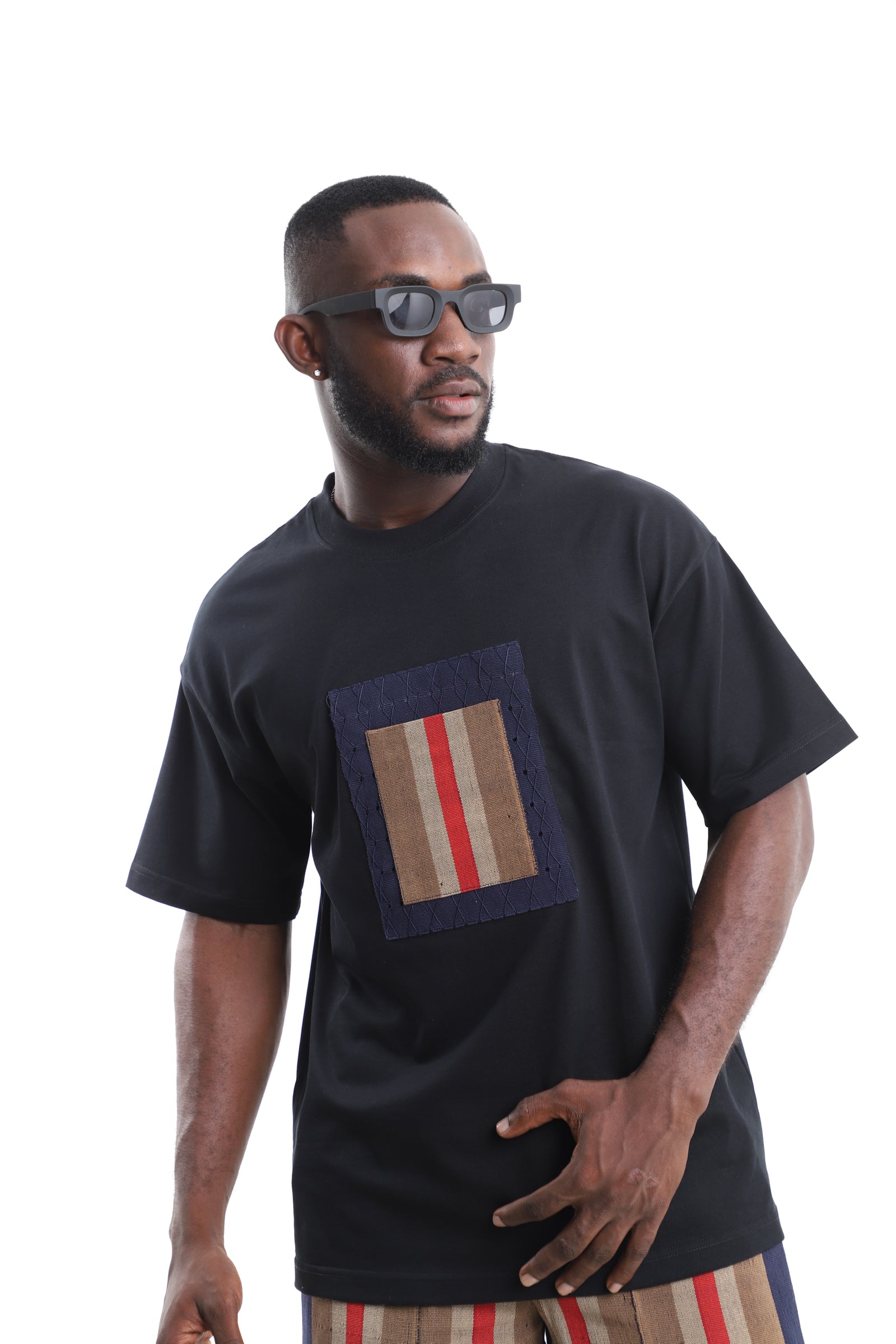 King Kaftan Black Cotton Oversized T-Shirt with Striped Patch – Front View – African men's fashion Nigeria