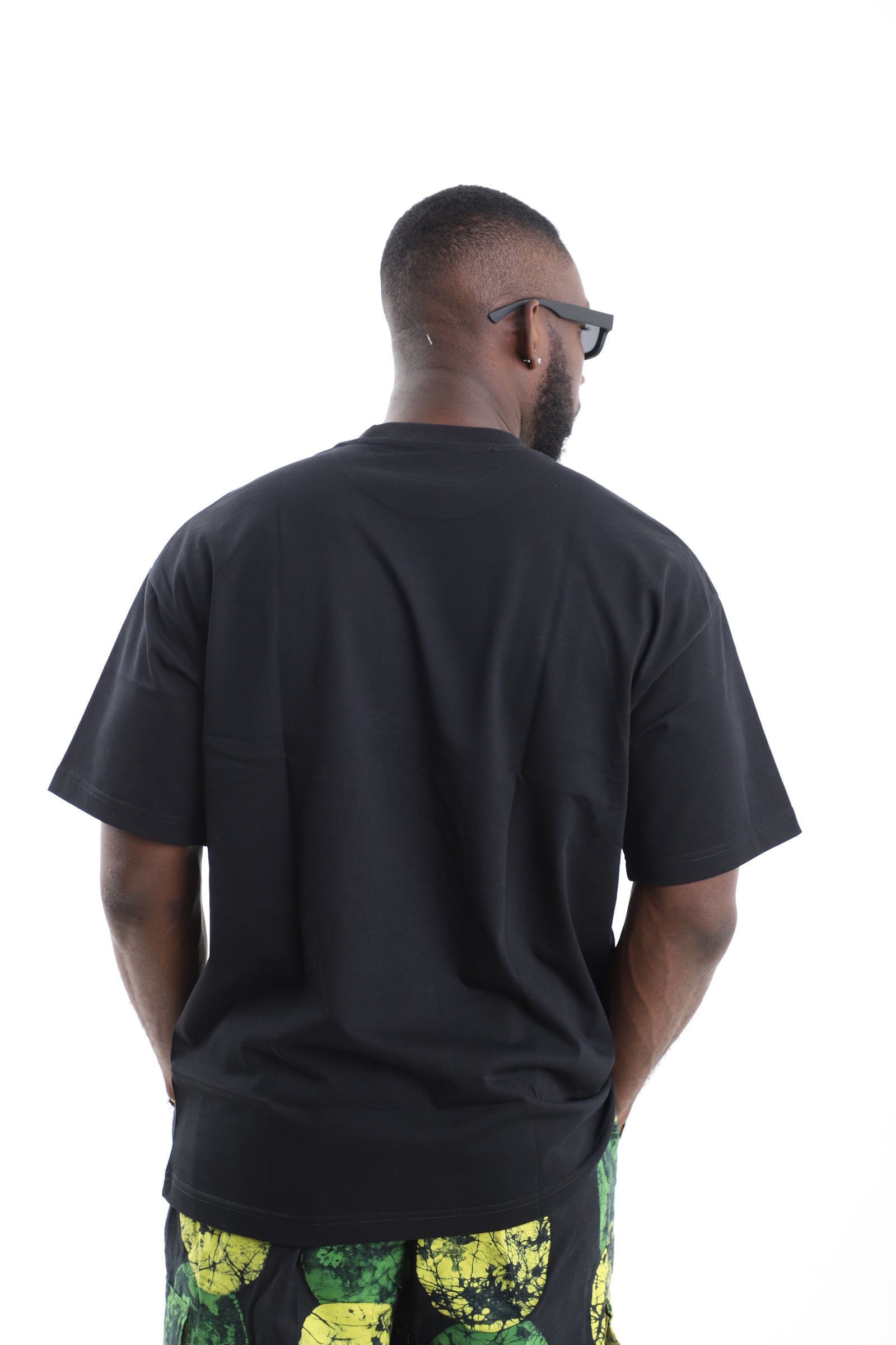 King Kaftan Cotton Oversized Black T-Shirt with Olive Textured Patch Pocket Accent – Back View – African men's fashion Nigeria