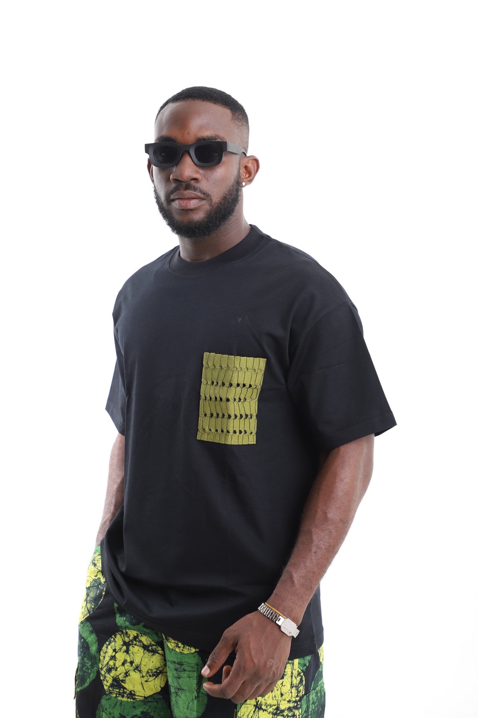 King Kaftan Cotton Oversized Black T-Shirt with Olive Textured Patch Pocket Accent – Side View – African men's fashion Nigeria