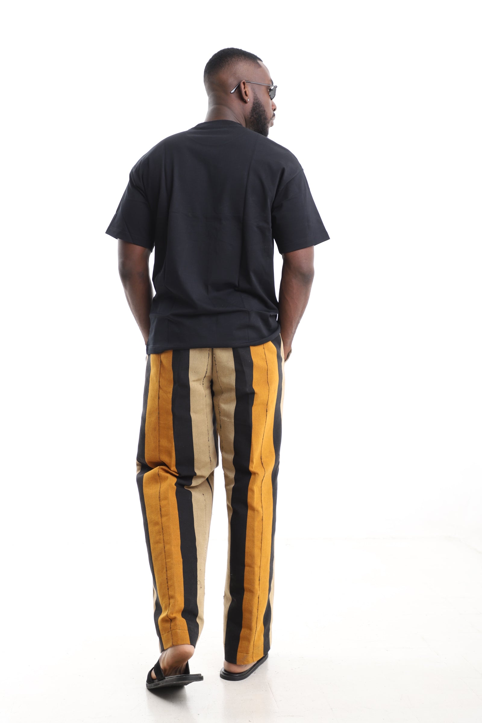 King Kaftan Handwoven Striped Cotton Aso-Oke Pants Set with Oversized Black T-Shirt – Back View – African men's fashion Nigeria