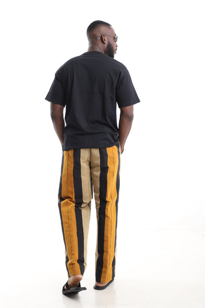 King Kaftan Handwoven Striped Cotton Aso-Oke Pants Set with Oversized Black T-Shirt – Back View – African men's fashion Nigeria