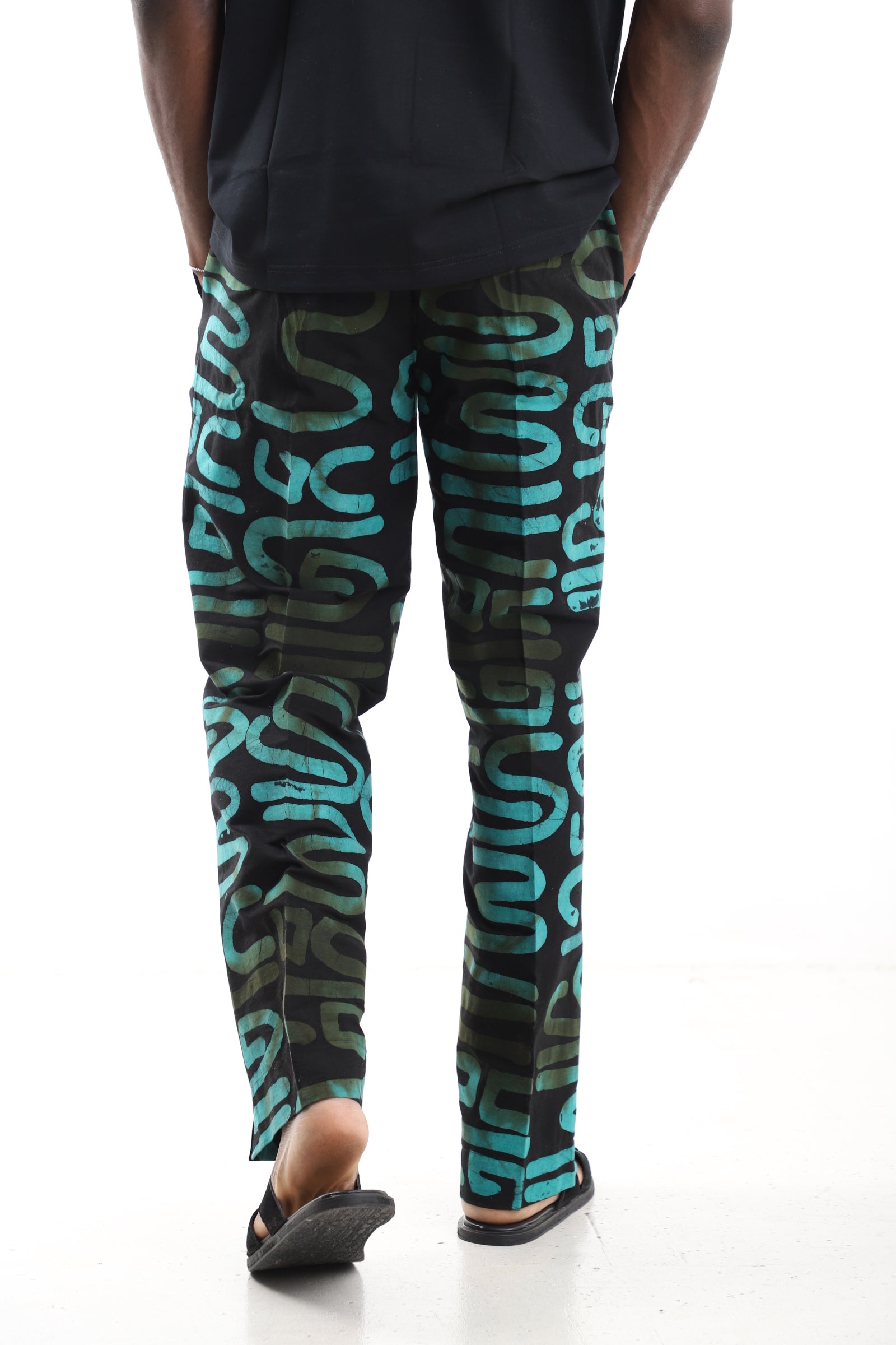 King Kaftan Black and Turquoise Abstract Calligraphy Adire Cargo Pants – Back View – African men's fashion Nigeria