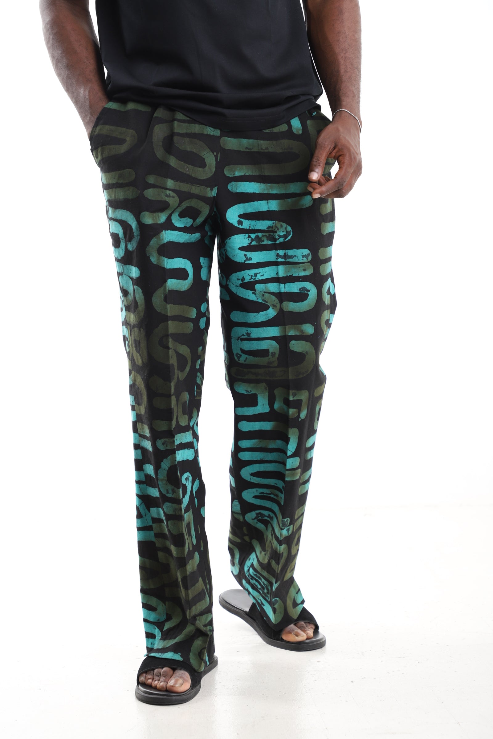 King Kaftan Black and Turquoise Abstract Calligraphy Adire Cargo Pants – Front View – African men's fashion Nigeria