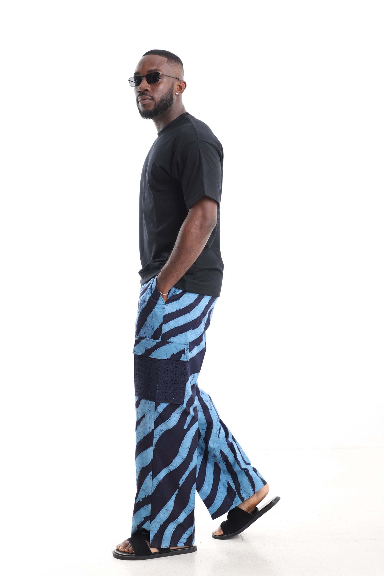 King Kaftan Blue Zebra Stripe Adire Cargo Pants Set with Oversized Black T-Shirt – Side View – African men's fashion Nigeria
