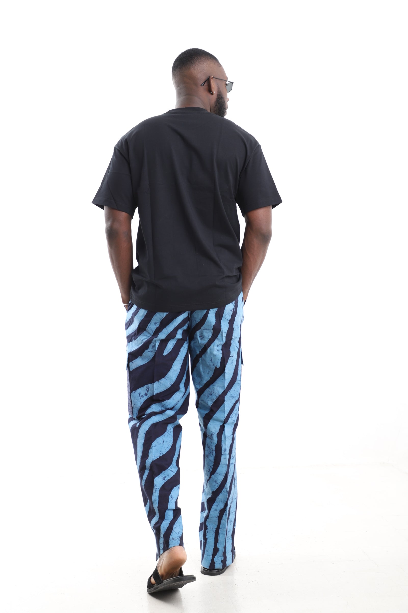 King Kaftan Blue Zebra Stripe Adire Cargo Pants Set with Oversized Black T-Shirt – Back View – African men's fashion Nigeria