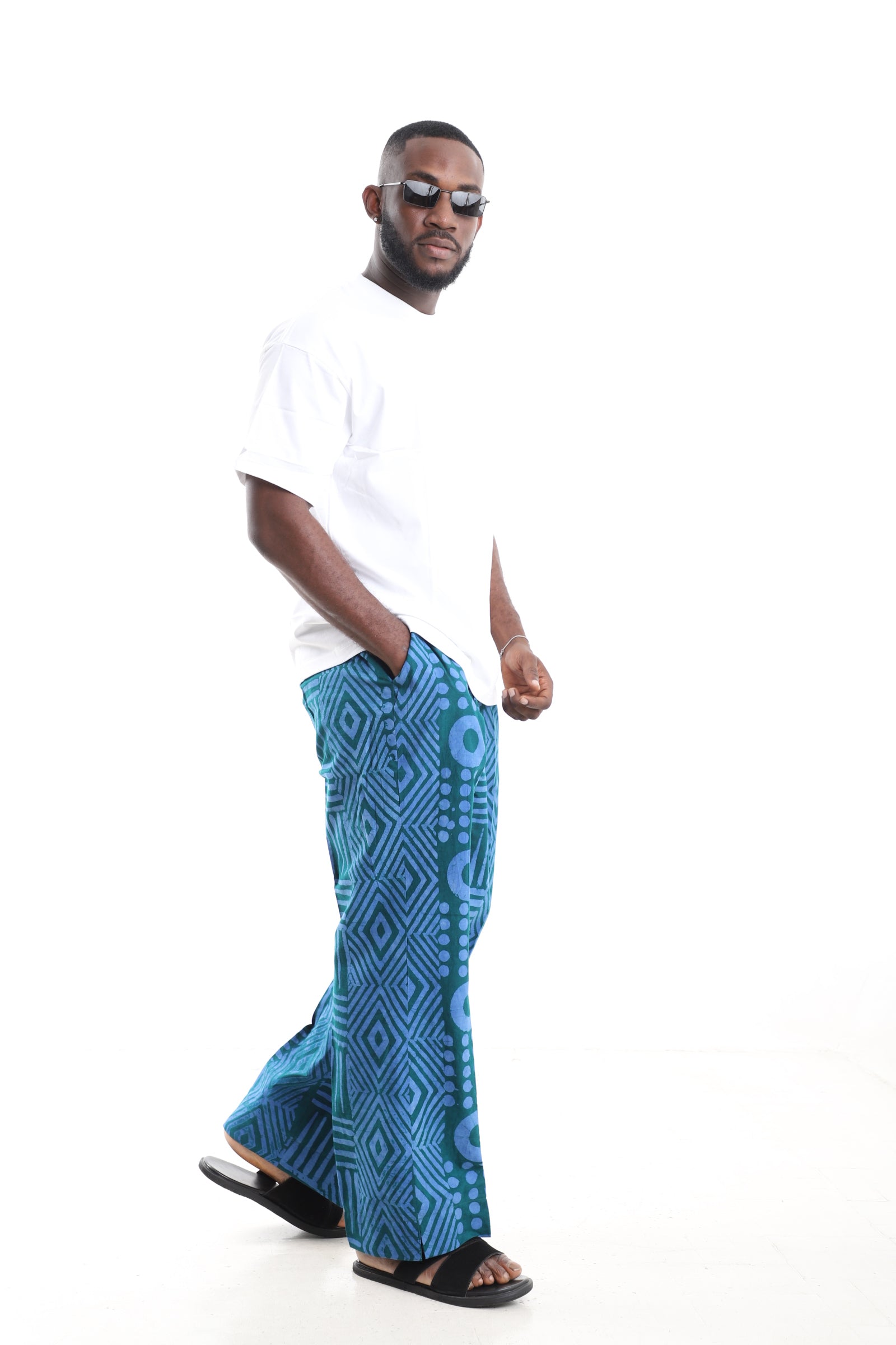 King Kaftan Teal Geometric Adire Cargo Pants Set with Oversized White T-Shirt – Side View – African men's fashion Nigeria