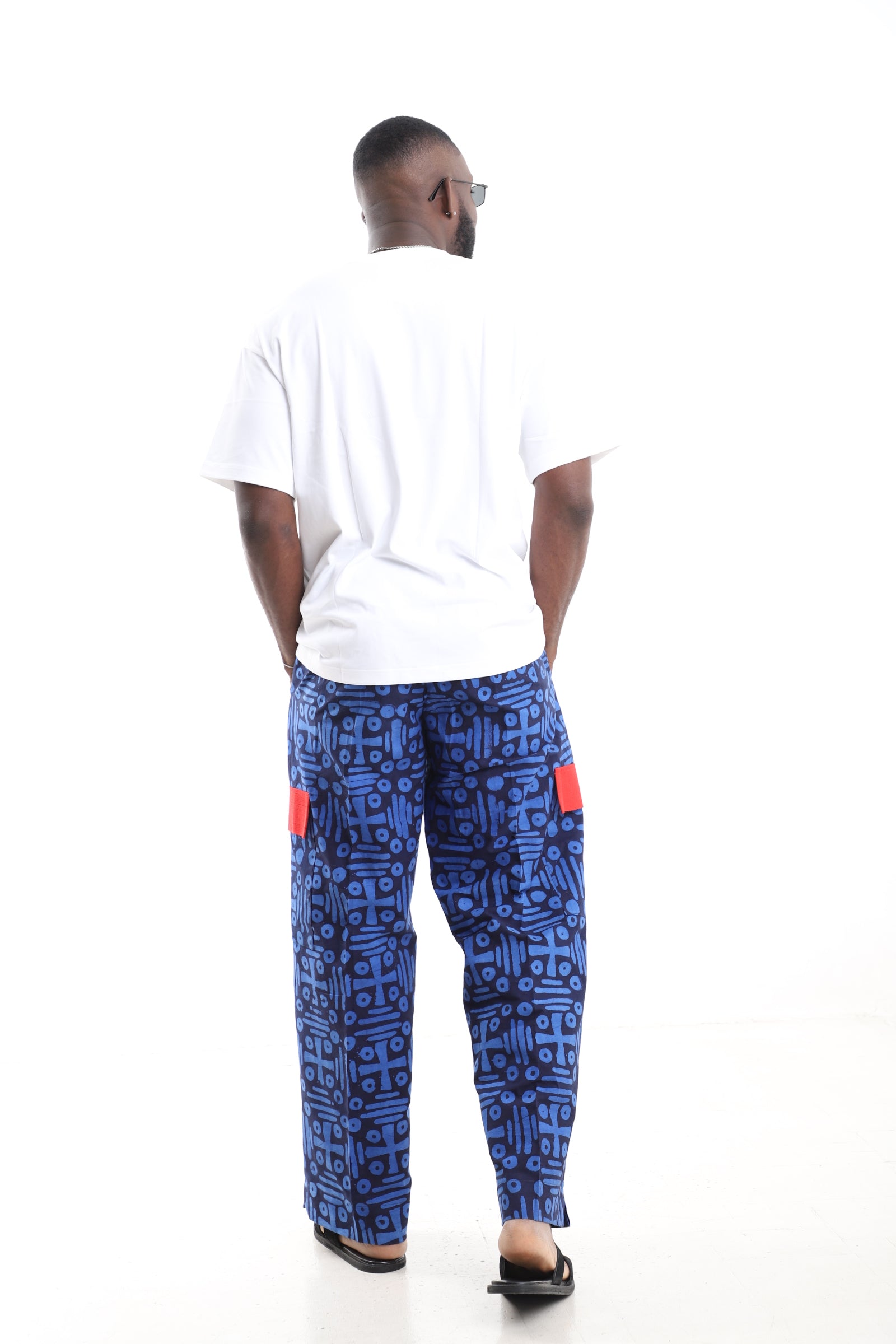 King Kaftan Blue Geometric Adire Cargo Pants Set with Oversized White T-Shirt – Back View – African men's fashion Nigeria