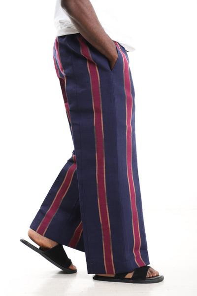 King Kaftan Striped Hand-Woven Aso-Oke Wide-Leg Trousers – Side View – African men's fashion Nigeria