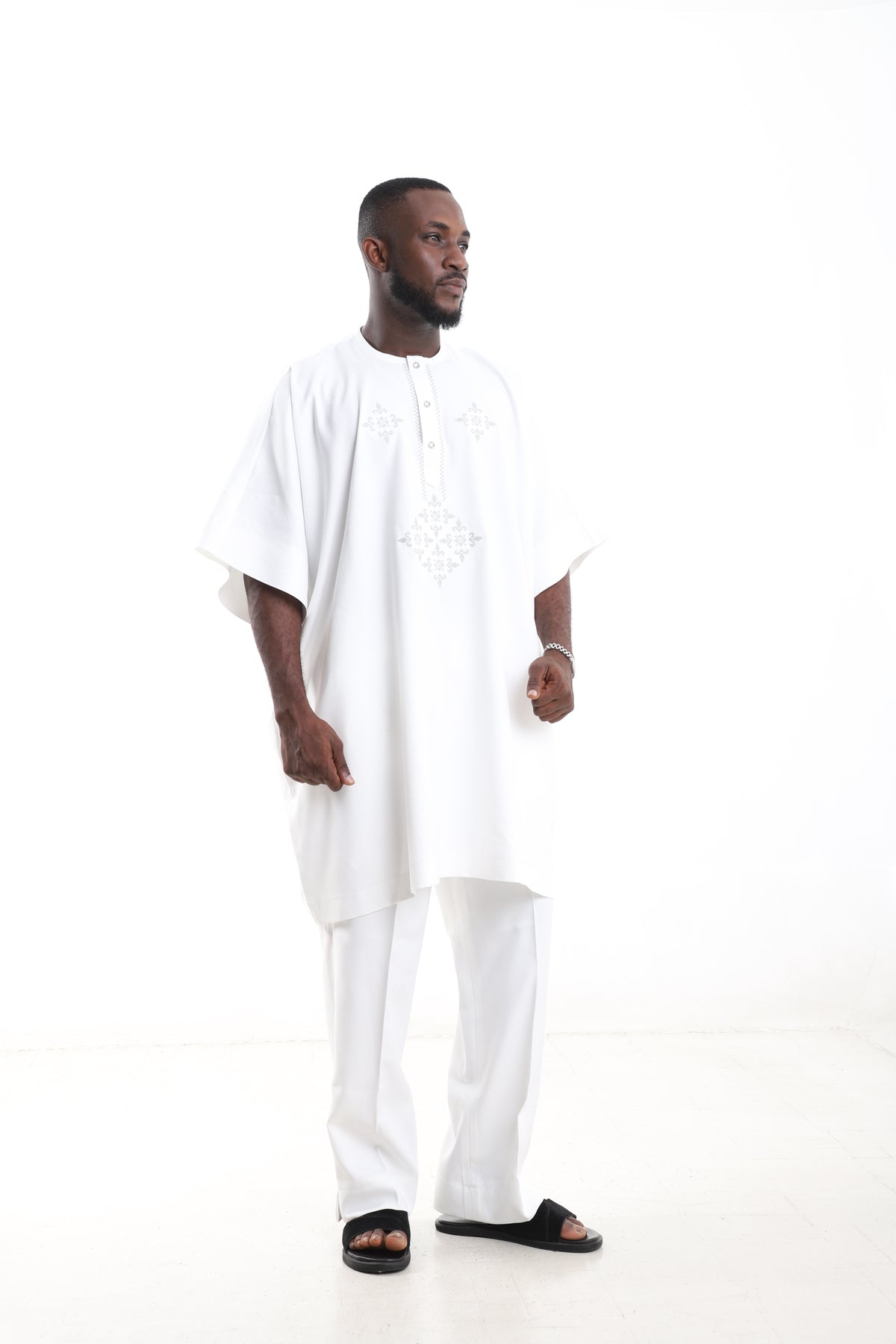 King Kaftan Ivory Embroidered Polished Cotton Traditional Danshiki Set – Side View – African men's fashion Nigeria