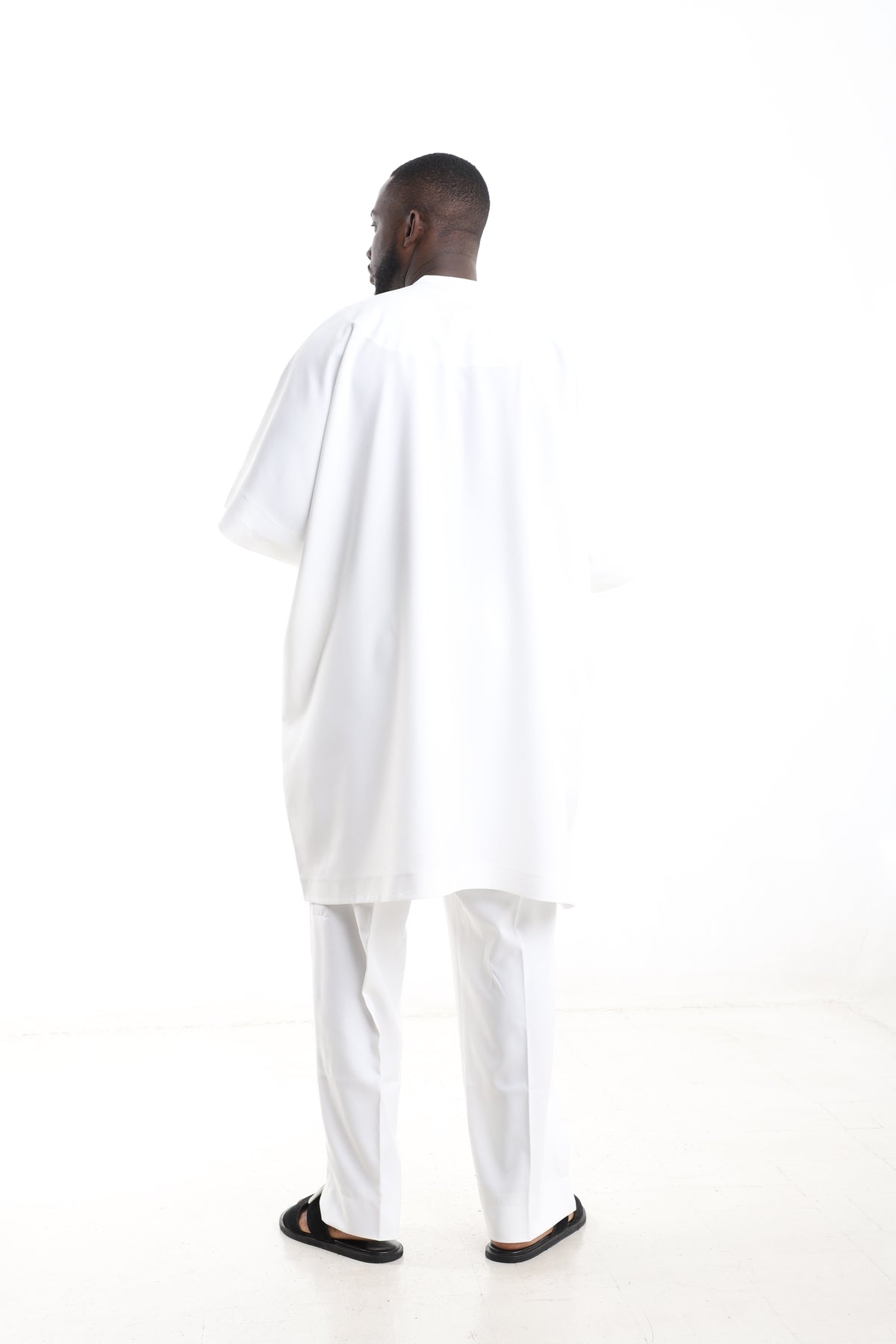 King Kaftan Ivory Embroidered Polished Cotton Traditional Danshiki Set – Back View – African men's fashion Nigeria