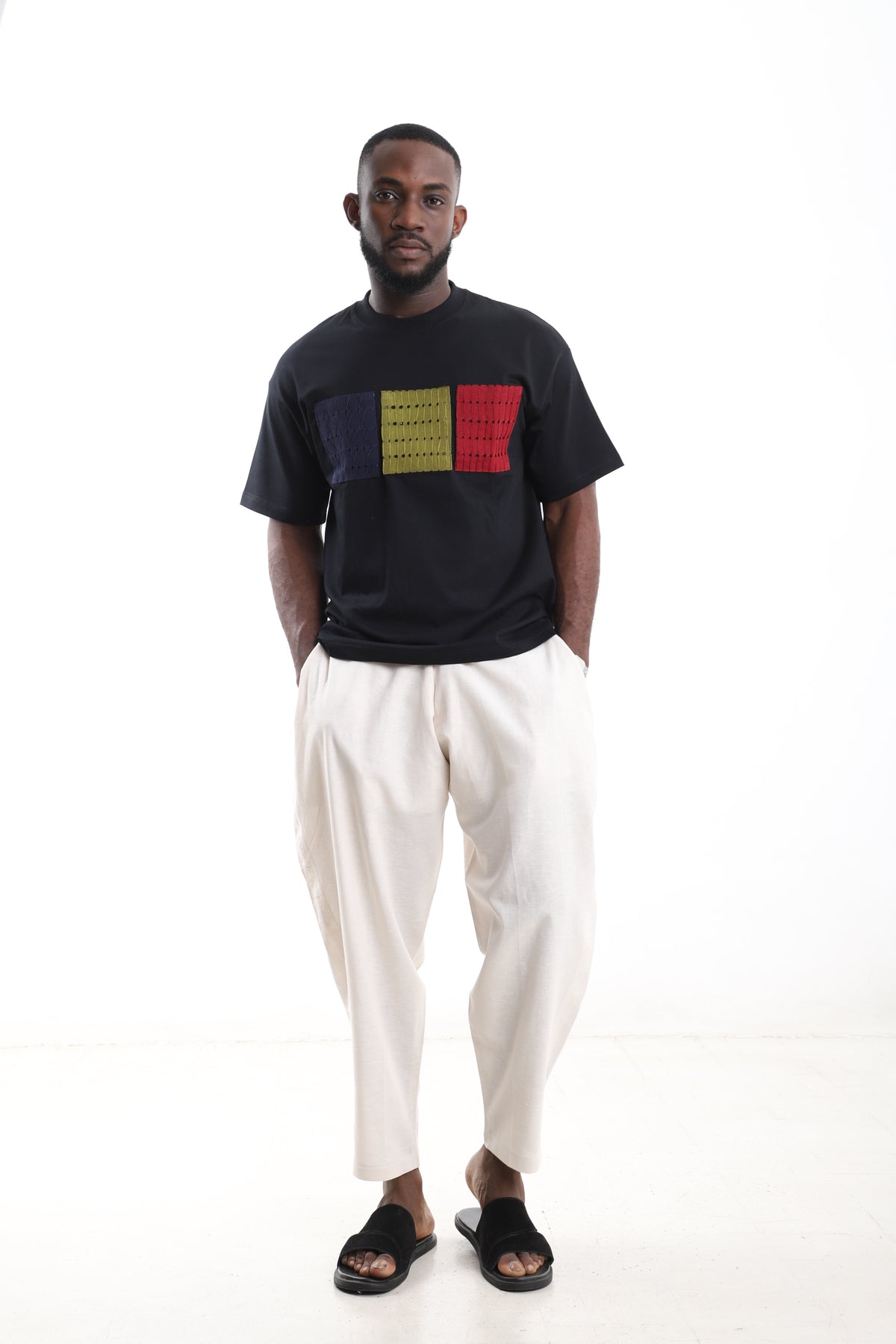 King Kaftan Block Patchwork T-Shirt and Cream Linen Pants Set – Front View – African men's fashion Nigeria