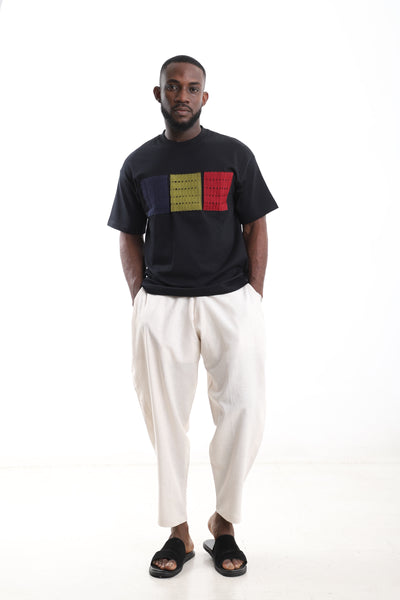 King Kaftan Block Patchwork T-Shirt and Cream Linen Pants Set – Front View – African men's fashion Nigeria