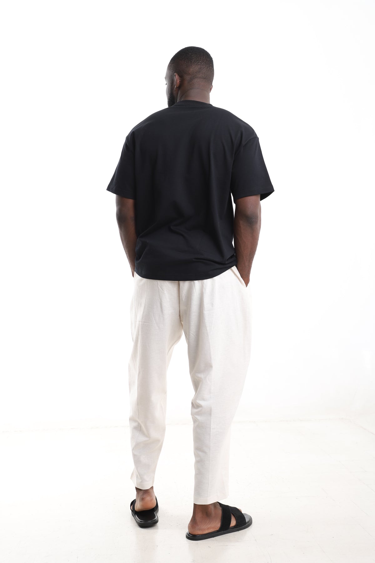 King Kaftan Block Patchwork T-Shirt and Cream Linen Pants Set – Back View – African men's fashion Nigeria