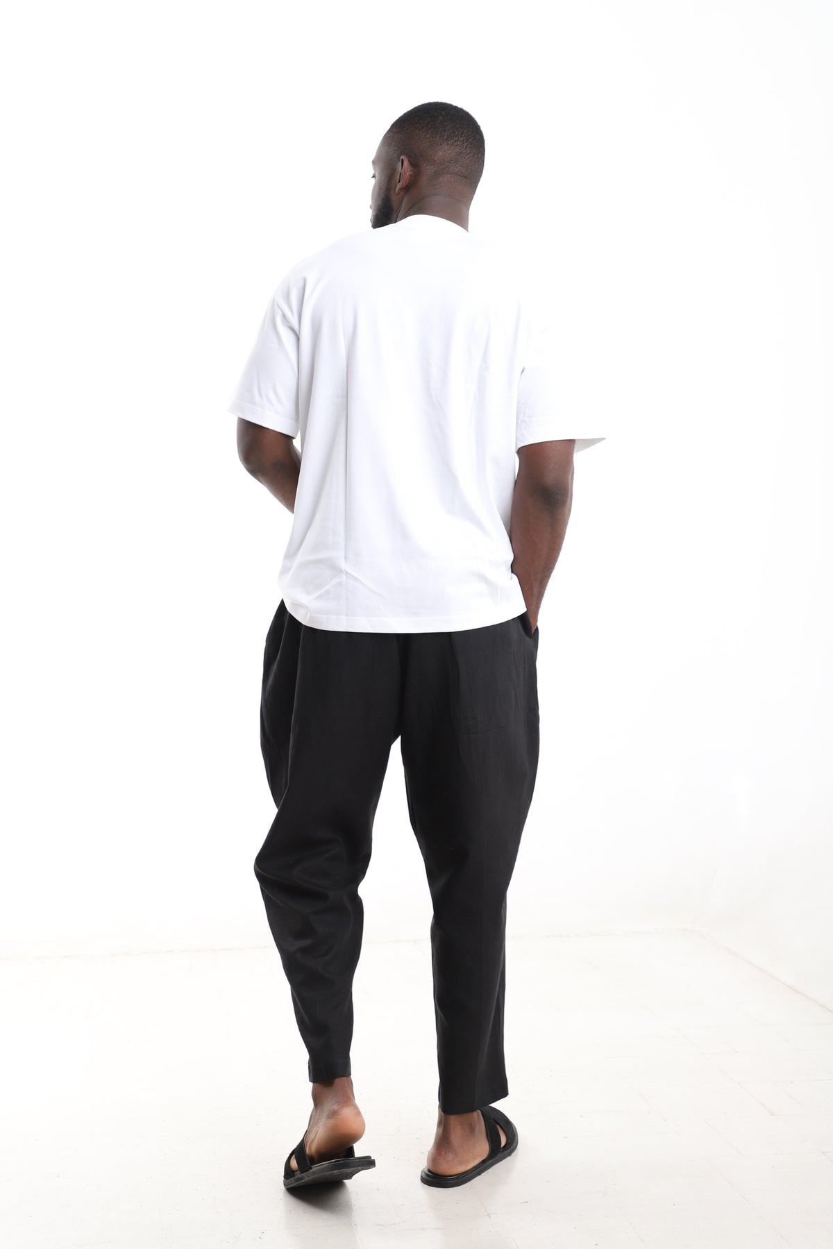 King Kaftan Block Patchwork T-Shirt and Black Linen Pants Set – Back View – African men's fashion Nigeria