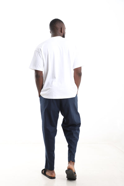 King Kaftan Block Patchwork T-Shirt and Navy Blue Linen Pants Set – Back View – African men's fashion Nigeria