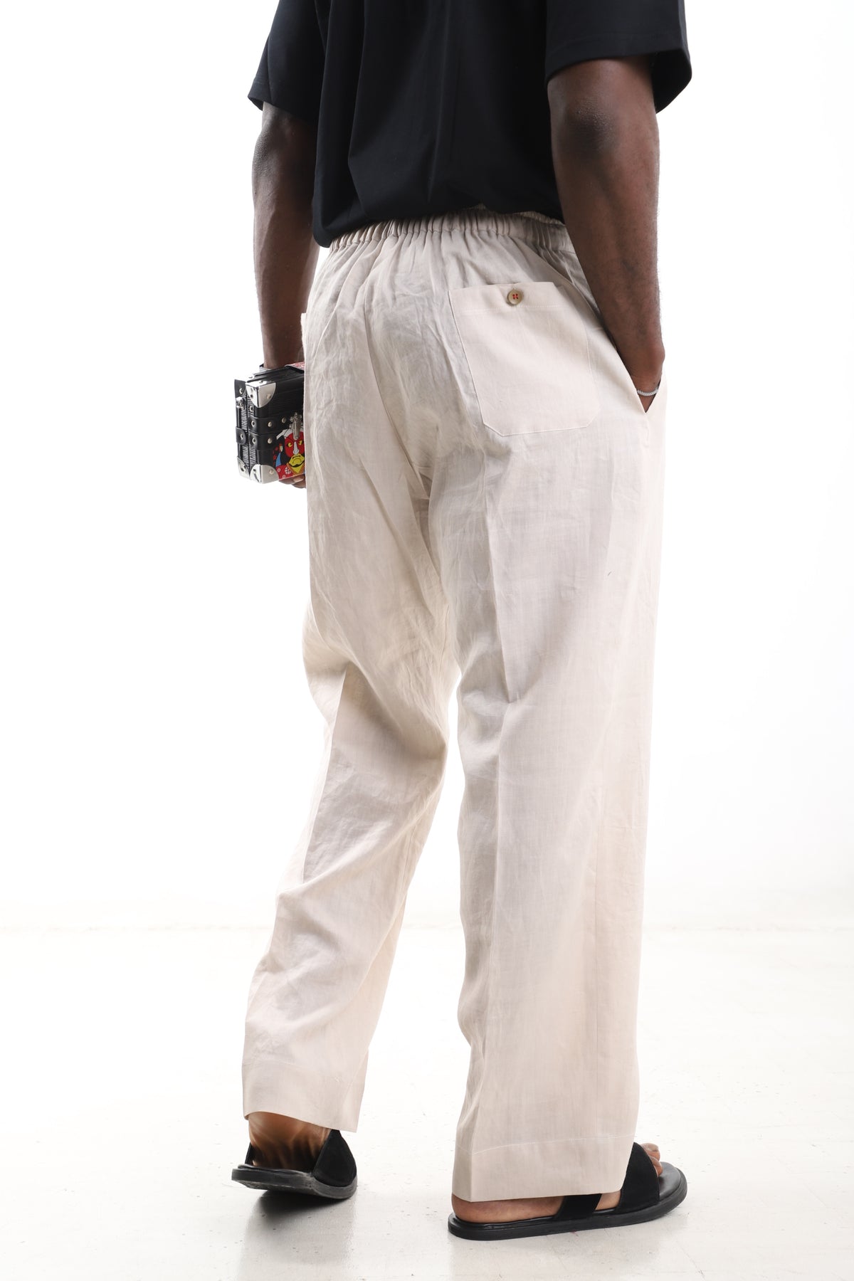 King Kaftan Drawstring Premium Off-White Linen Wide-Leg Pants – Back View – African men's fashion Nigeria