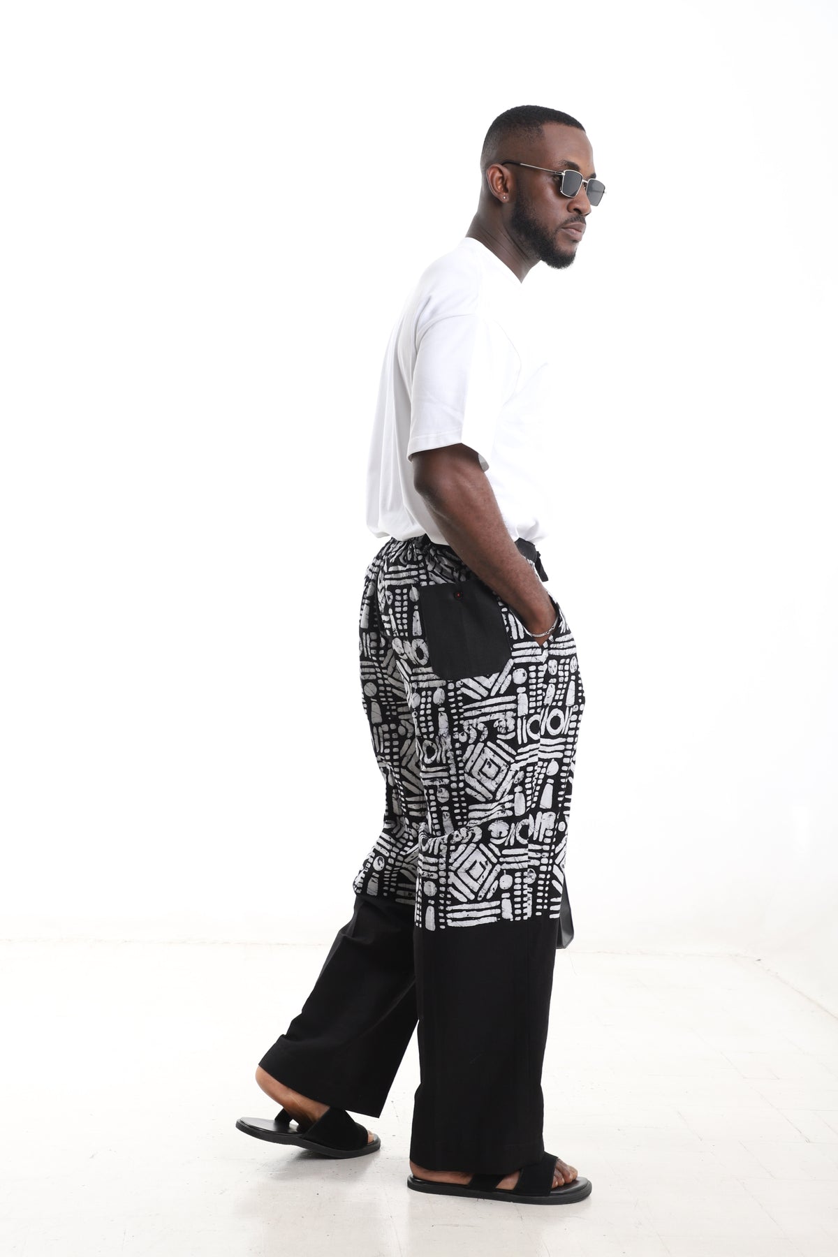 King Kaftan Tribal Motif Two-Tone Batik Cotton Black & White Adire Pants – Detail View – African men's fashion Nigeria