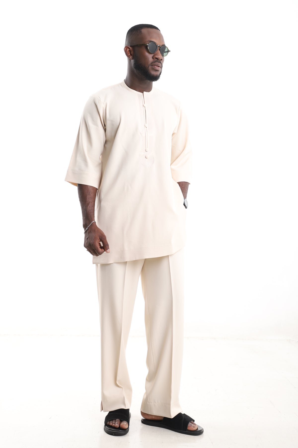 King Kaftan Pintuck-Placket Polished Cotton Cream Senator Wear – Side View – African men's fashion Nigeria