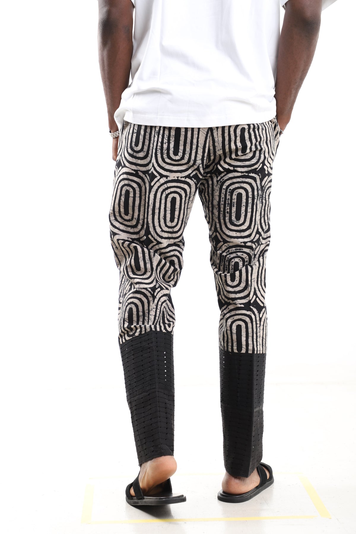 King Kaftan Concentric Ring Batik Cotton Black & Beige Adire Pants – Back View – African men's fashion Nigeria
