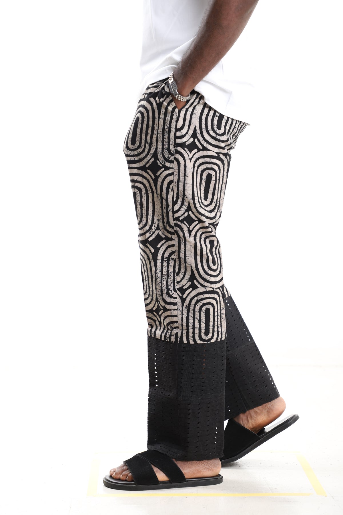 King Kaftan Concentric Ring Batik Cotton Black & Beige Adire Pants – Side View – African men's fashion Nigeria
