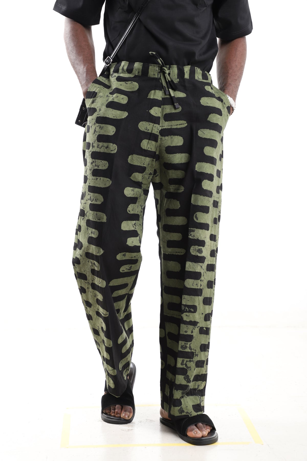 King Kaftan Vertical Stripe Batik Cotton Olive & Black Adire Pants – Front View – African men's fashion Nigeria