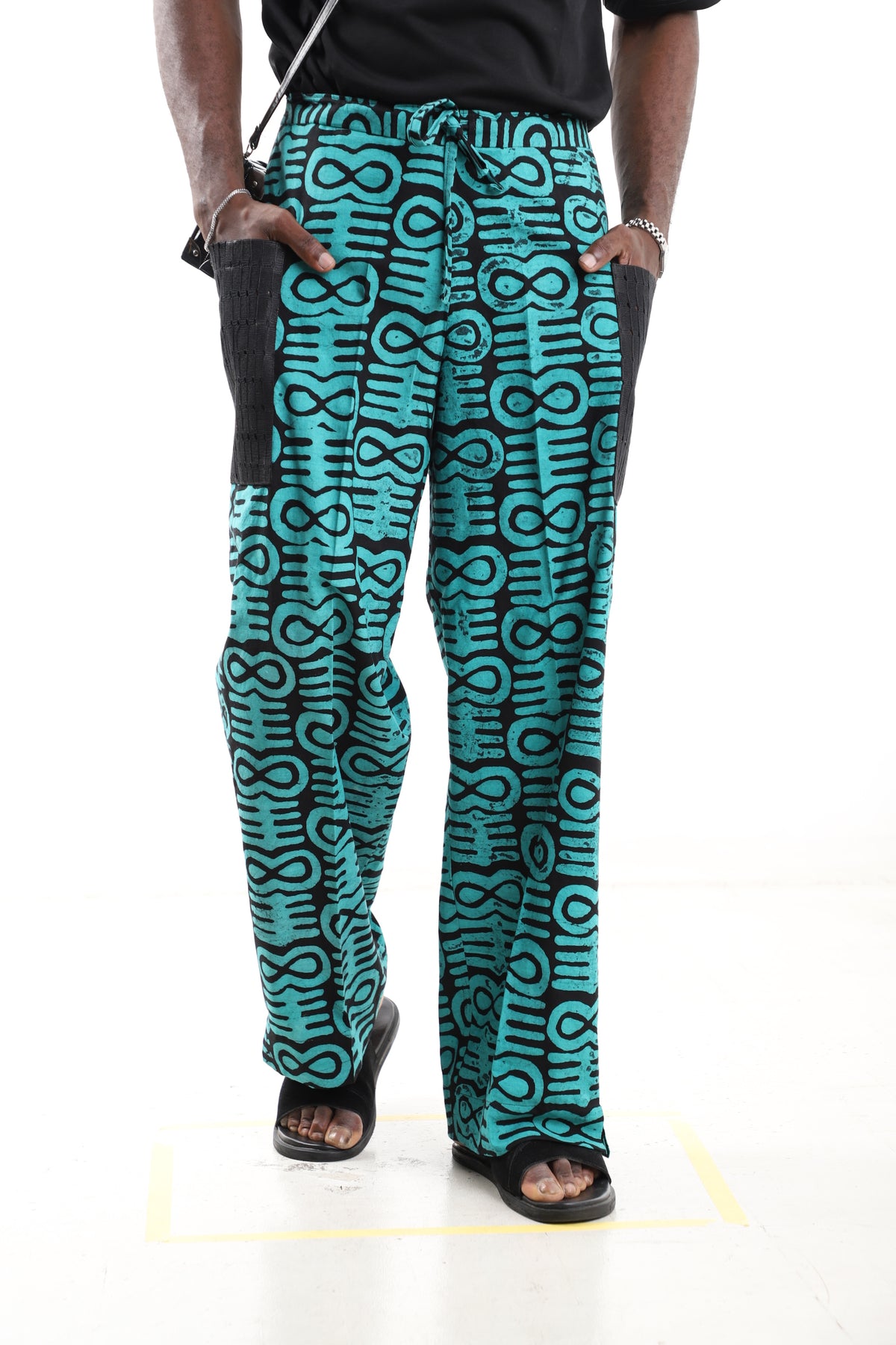 King Kaftan Geometric Print Cotton Turquoise & Black Adire Pants – Front View – African men's fashion Nigeria