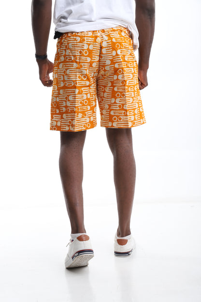 The Solar Beat Shorts – Orange Adire Edition