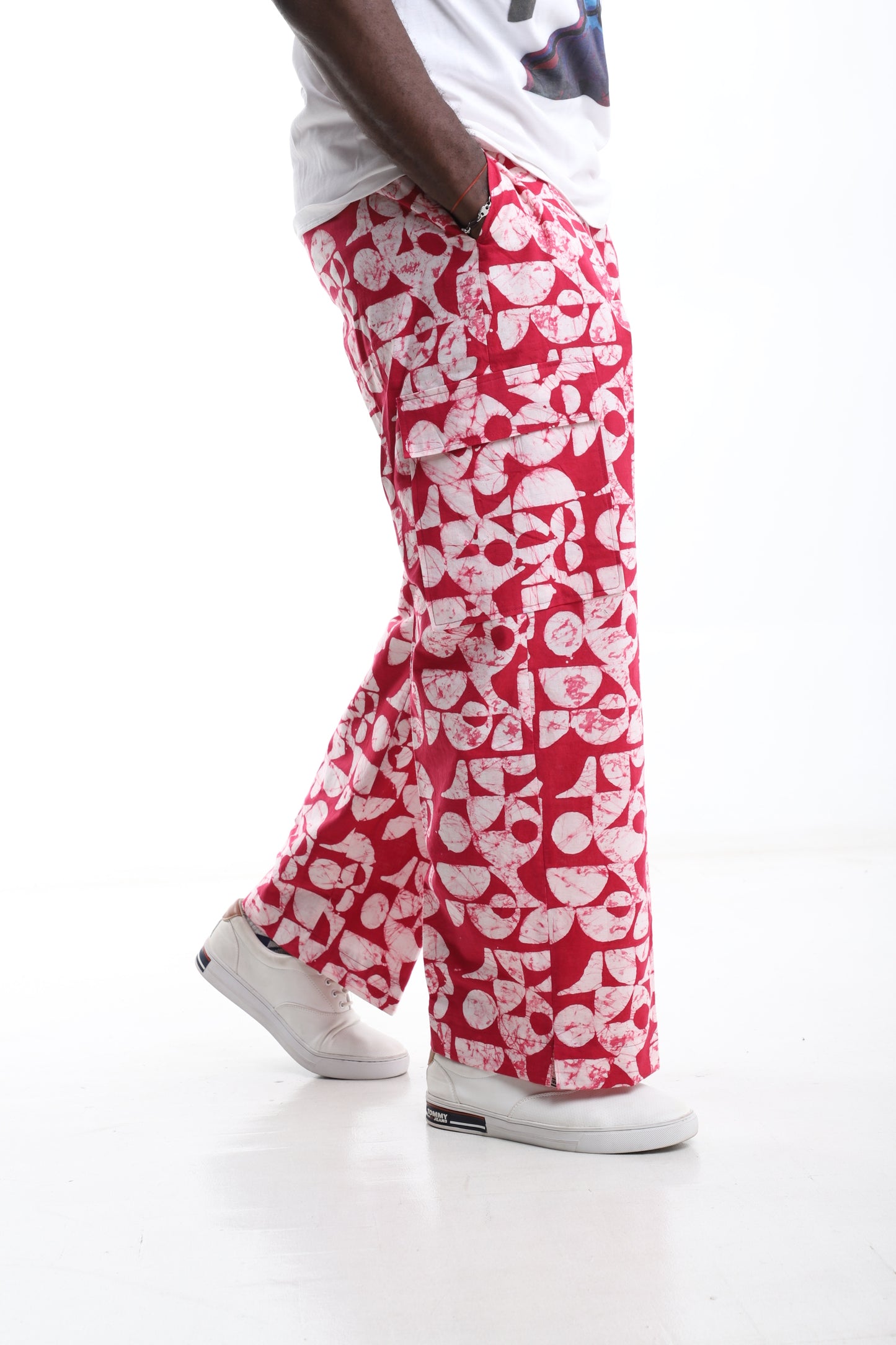 Bold Red Adire Cargo Trousers – Hand-Dyed Streetwear Statement